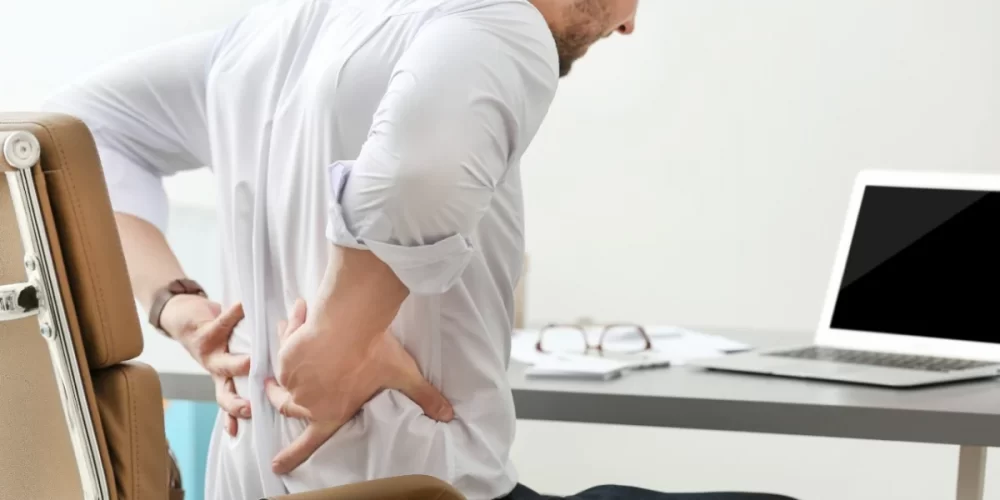 HOW TO PREVENT BACK PAIN WHILE WORKING FROM HOME